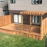 Custom made deck with built-in pergola cover